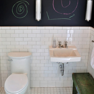 Example of a small mountain style 3/4 white tile and subway tile mosaic tile floor bathroom design in New York with a wall-mount sink, a one-piece toilet and black walls