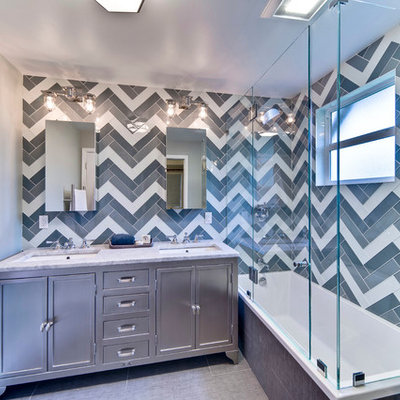 Bathroom - mid-sized transitional master multicolored tile and glass tile ceramic tile bathroom idea in San Francisco with an undermount sink, marble countertops and gray walls