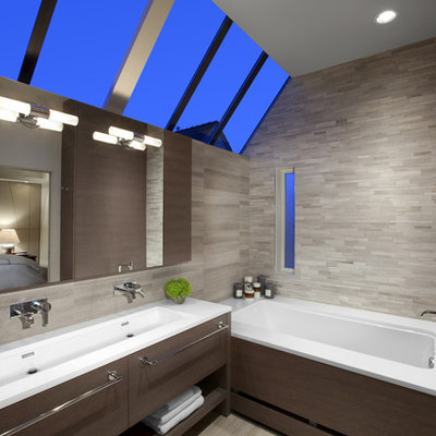 Corner shower - large contemporary master beige tile and porcelain tile porcelain tile corner shower idea in Vancouver with a trough sink, flat-panel cabinets, an undermount tub, dark wood cabinets, beige walls and quartz countertops