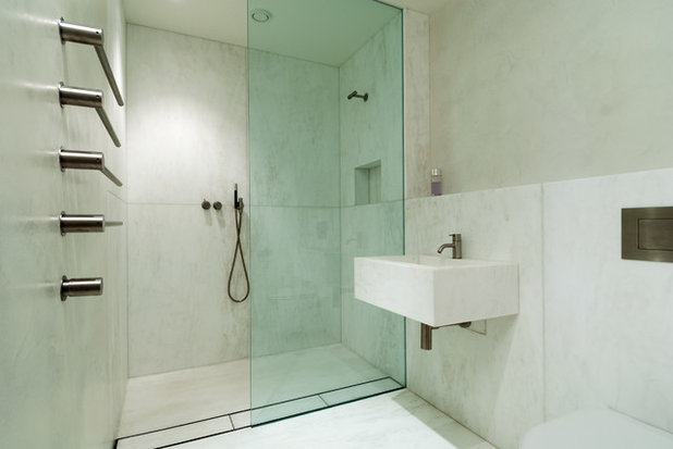 Modern Bathroom by Modern Home Solutions