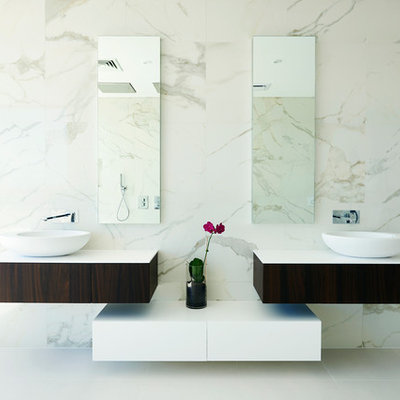 Trendy stone tile bathroom photo in Perth with a vessel sink and flat-panel cabinets