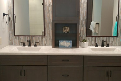 Example of a large transitional master bathroom design in Cincinnati with shaker cabinets