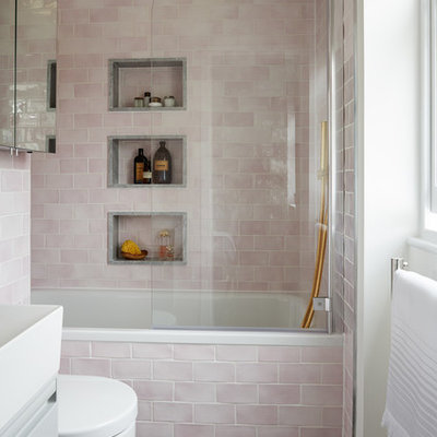 Bathroom - small transitional pink tile and subway tile ceramic tile and multicolored floor bathroom idea in London with flat-panel cabinets, white walls, gray cabinets and white countertops