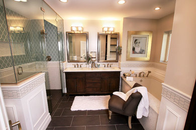 Mid-sized transitional master green tile and mosaic tile porcelain tile doorless shower photo in Other with furniture-like cabinets, distressed cabinets, an undermount tub, a two-piece toilet, beige walls, an undermount sink and quartz countertops