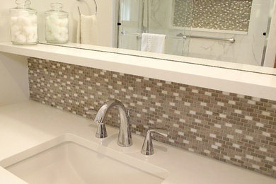 Inspiration for a mid-sized contemporary 3/4 beige tile and mosaic tile porcelain tile bathroom remodel in Vancouver with an undermount sink, flat-panel cabinets, white cabinets, quartz countertops, a two-piece toilet and white walls