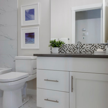 Bjornson Designs - kitchen + bath cabinetry for Rockford Developments