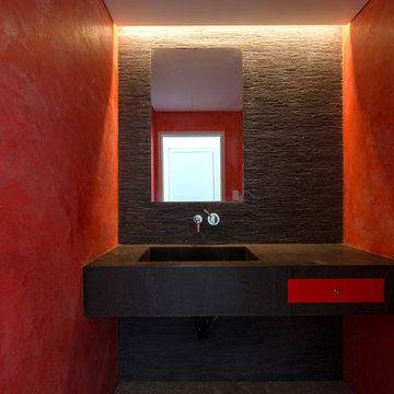 black and red powder room