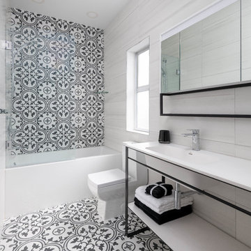 black and white bathroom design with Spanish tiles and open vanity