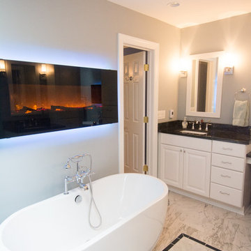 Black and White Bathroom with See-Through Fireplace