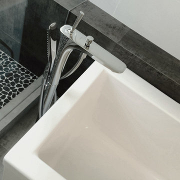 black and white floating bath + freestanding tub filler