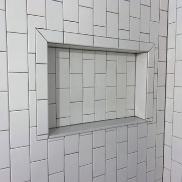 Black & white patterned tile bathroom