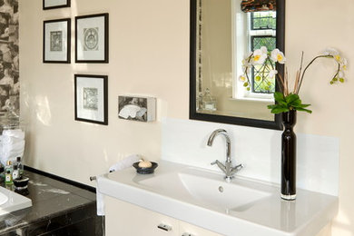 Photo of a contemporary cream and black bathroom in West Midlands.