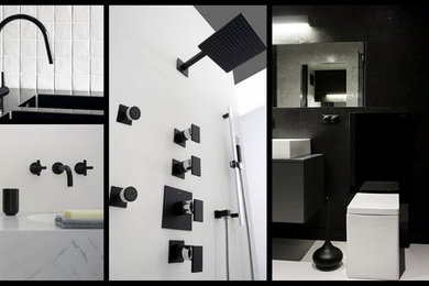 Imagen de cuarto de baño contemporáneo con baldosas y/o azulejos negros y paredes negras