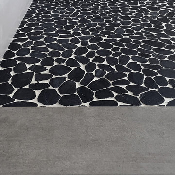 black + white sliced pebble tile floor