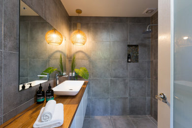 Example of a beach style bathroom design in Wollongong