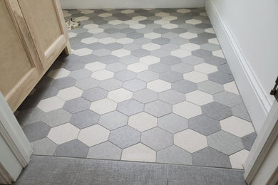 Inspiration for a mid-sized modern kids' porcelain tile and multicolored floor bathroom remodel in Minneapolis with shaker cabinets, light wood cabinets and a freestanding vanity