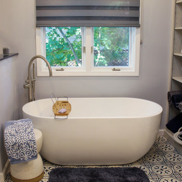 Blue and White Bathroom with Soaker Tub, Makeup Vanity and Tiled Shower