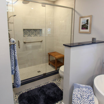 Blue and White Bathroom with Soaking Tub, Makeup Vanity and Tiled Shower
