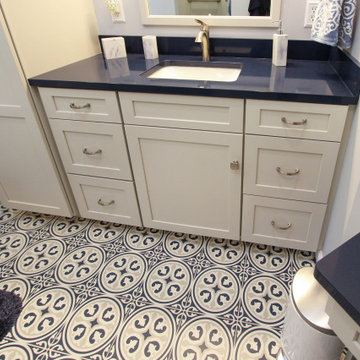 Blue and White Bathroom with Soaking Tub, Makeup Vanity and Tiled Shower