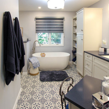 Blue and White Bathroom with Soaking Tub, Makeup Vanity and Tiled Shower
