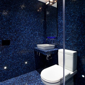 Blue bathroom with glass mosaic tile