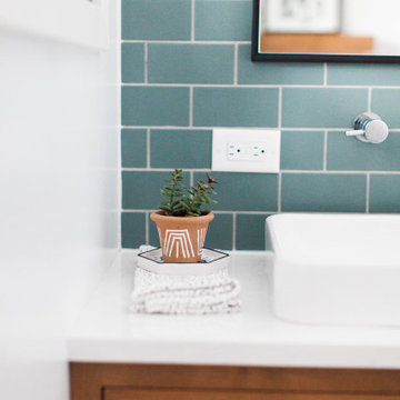 Blue Subway Tiles Backsplash with Wood Vanity