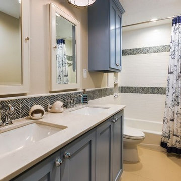 Boy's Bathroom Remodel Quartz Countertops and Tile Backsplash