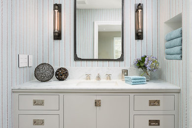 Example of a small transitional kids' limestone floor bathroom design in Los Angeles with an undermount sink, flat-panel cabinets, gray cabinets, marble countertops and multicolored walls