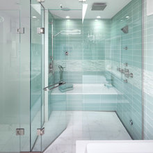like the tiles and the layout of dual shower heads; tub