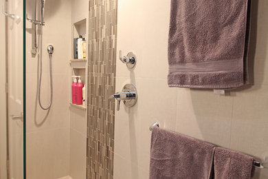 Large classic ensuite bathroom in Detroit with flat-panel cabinets, dark wood cabinets, a walk-in shower, grey tiles, porcelain tiles, grey walls, porcelain flooring, a submerged sink, engineered stone worktops, grey floors, an open shower, multi-coloured worktops and a one-piece toilet.