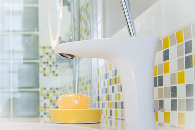 Bathroom - eclectic multicolored tile and mosaic tile bathroom idea in Other