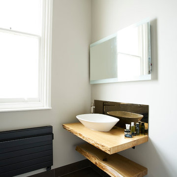 Bronze main bathroom with floating oak shelves, Hove