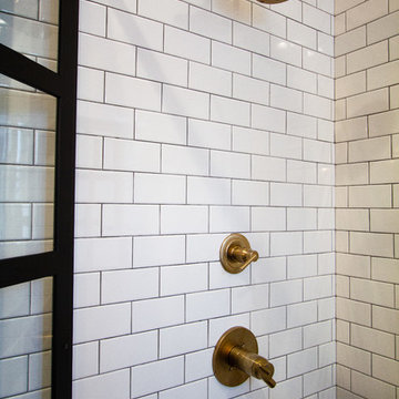 Bronze Shower Fixtures Paired with Classic White Subway
