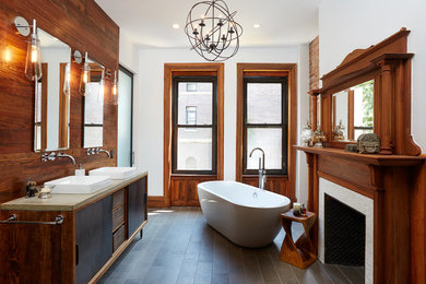 Bathroom - large transitional master ceramic tile bathroom idea in New York with white walls, a vessel sink, concrete countertops, flat-panel cabinets and black cabinets