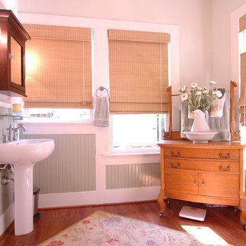 Bungalow Bathroom with pedestal sink and dry sink