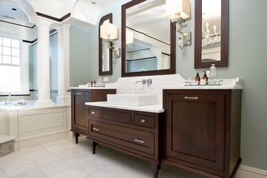 Large elegant master marble floor and gray floor bathroom photo in Boston with shaker cabinets, dark wood cabinets, green walls, a vessel sink, marble countertops and white countertops