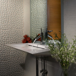 Design ideas for a small contemporary 3/4 bathroom in Miami with a vessel sink, open cabinets, white cabinets, marble benchtops, a freestanding tub, a double shower, a one-piece toilet, white tile, pebble tile, white walls and marble floors.
