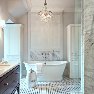 Example of a classic gray tile and mosaic tile marble floor bathroom design in Toronto with an undermount sink, flat-panel cabinets, dark wood cabinets, marble countertops and gray walls