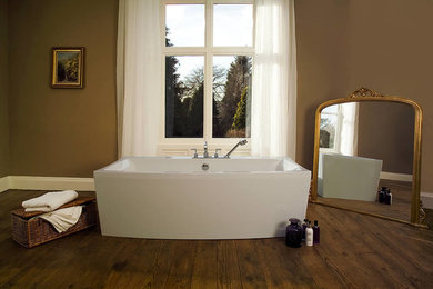 Design ideas for an expansive classic family bathroom in Other with a freestanding bath, brown walls and dark hardwood flooring.