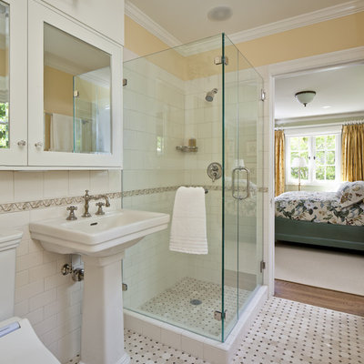 Inspiration for a timeless mosaic tile alcove shower remodel in San Francisco with a pedestal sink