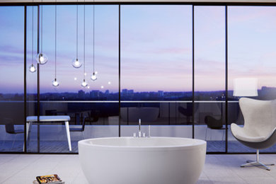 トロントにあるラグジュアリーな巨大なコンテンポラリースタイルのおしゃれなマスターバスルーム (置き型浴槽、グレーのタイル、磁器タイル、磁器タイルの床) の写真