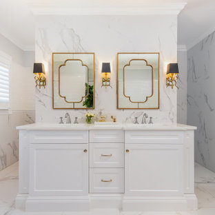 Inspiration for a traditional bathroom in Brisbane with recessed-panel cabinets, white cabinets, white tile, an undermount sink, white floor, white benchtops, a double vanity and a built-in vanity.