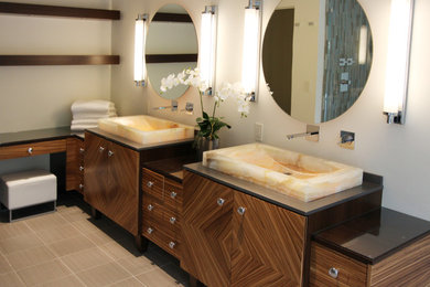 Example of a mid-sized trendy master bathroom design in San Francisco with flat-panel cabinets, medium tone wood cabinets, white walls and a pedestal sink