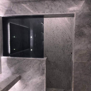 Carrara marble bathroom by ADL Tile and Stone