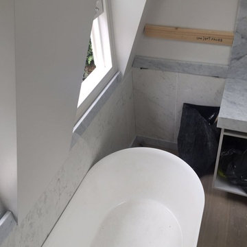 Carrara Marble Bathroom features