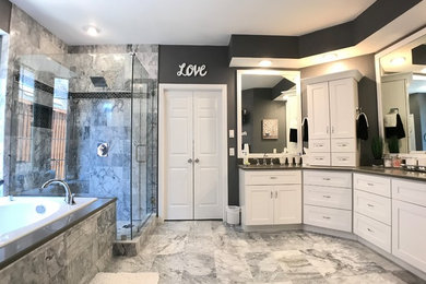 Example of a transitional master black and white tile and marble tile marble floor and gray floor bathroom design in Dallas with shaker cabinets, white cabinets, gray walls, an undermount sink, quartzite countertops, a hinged shower door and gray countertops