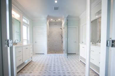 Transitional master white tile and marble tile marble floor and white floor bathroom photo in Raleigh with furniture-like cabinets, white cabinets and quartz countertops