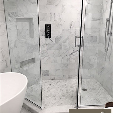 Carrara Marble Shower with Mosaic Floor Tile