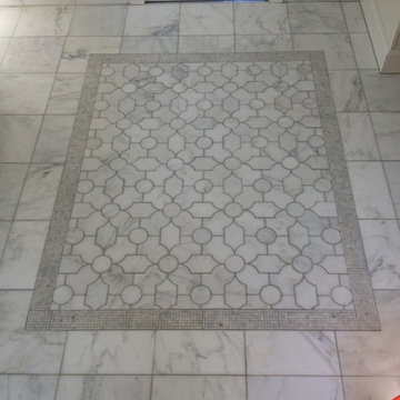 Carrara stone bathroom floor