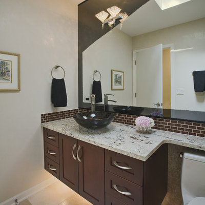 Inspiration for a contemporary bathroom remodel in Chicago with a vessel sink
